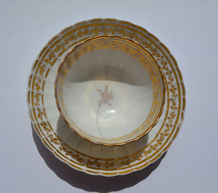 1790 bowl and saucer also one two three four pounds because the plate is stapled!