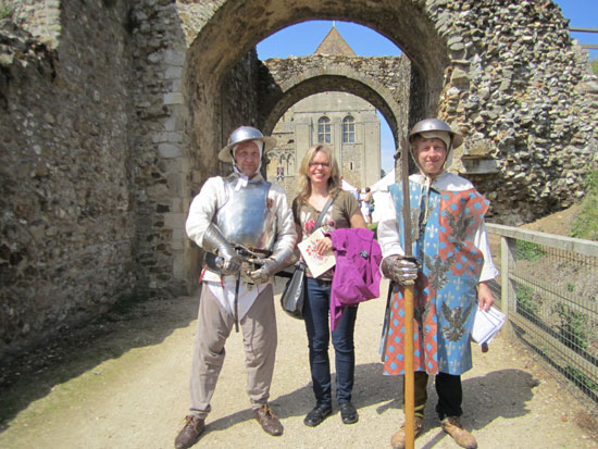 Becky posing with two medieval knights...