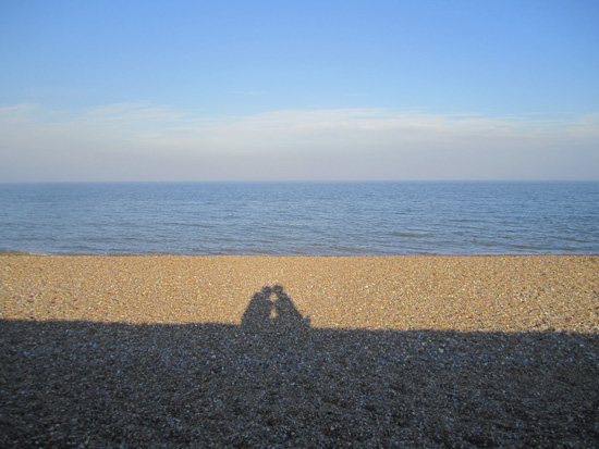 The shadows of me and the Goblin kissing on the beach...